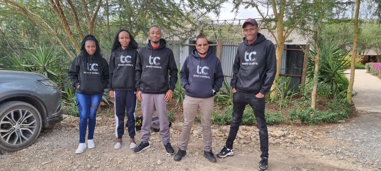 Timely Coders team collaborating